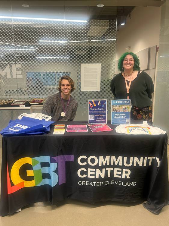 LGBT Community Center of Greater Cleveland staff members Hunter Evans, left, and Emma Place organize the Queer Clothing Swaps.