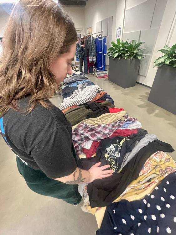 The free community clothing exchange celebrates queer style, self-expression, and sustainability!