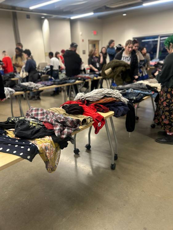 The free community clothing exchange celebrates queer style, self-expression, and sustainability!