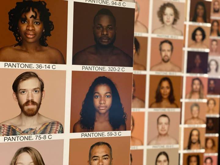 The Humanæ project by Brazilian artist Angélica Dass shows portraits of people whose skin tone is matched to a Pantone color card to challenge concepts of race.