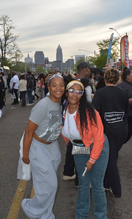Best friends enjoying the festival as well as the skyline view.