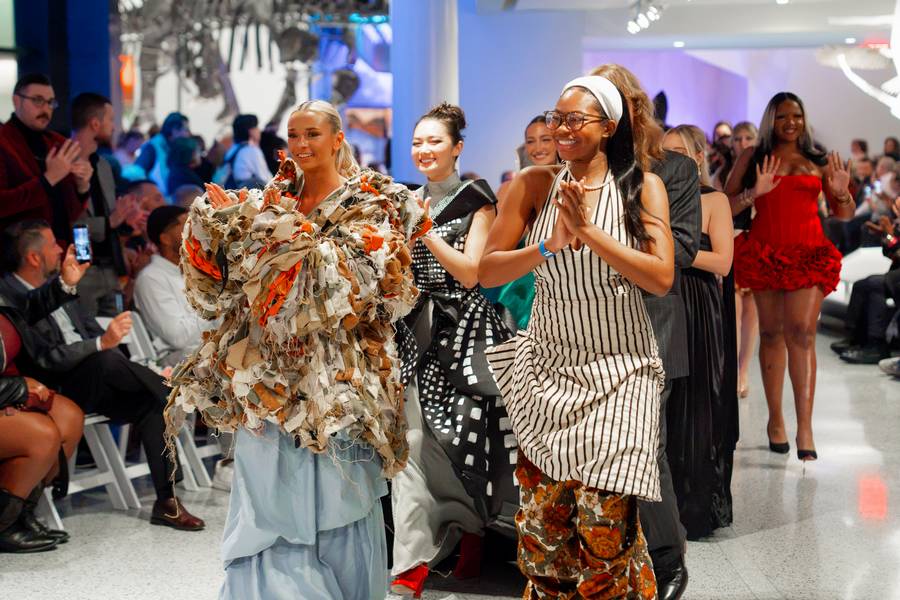 Models wear feather-inspired designs for 'Fashion & Feather,' a collaboration between the Cleveland Museum of Natural History and Kent State University.
