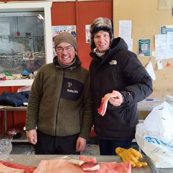 Chrostowski cleaning fish on his last trip to Ukraine.