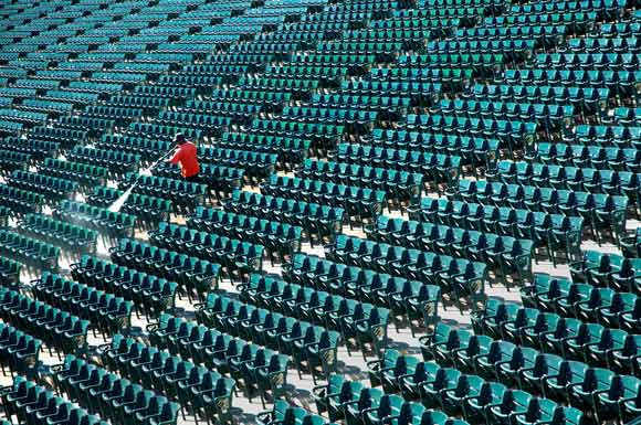 Cleaning the seats at Progressive Field