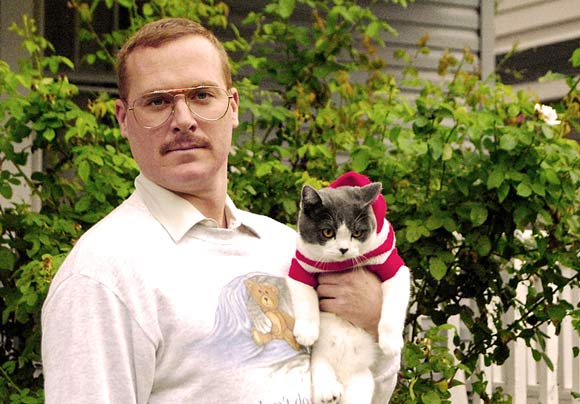 Mike Polk, Jr. with his cat, Macduff  - Photo © Jim Tews