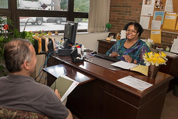 Joyce Jones, Case Manager helping Juan Rios Soto with employment at The May Dugan Center