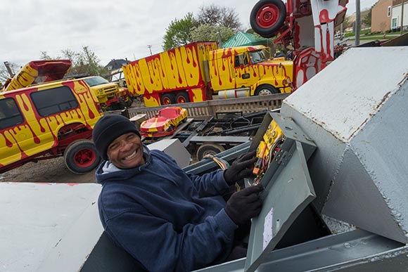 Tim Willis at the controls of the giant robot and his dog