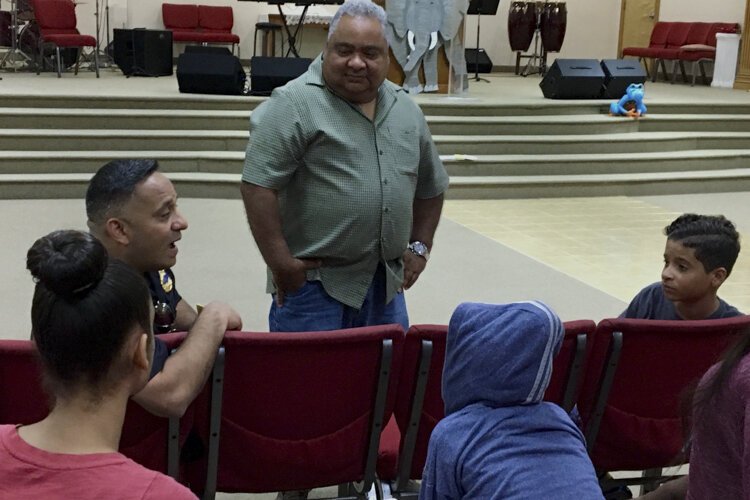 Hispanic Police Officers Association outreach event at Primera Iglesia Bautista