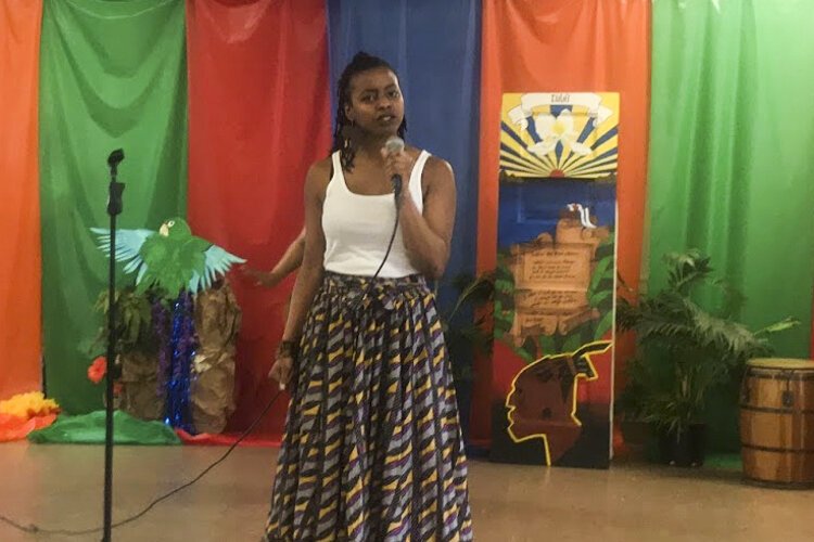 Arien Hodges performs a Spoken Word poem at Hasani Management.