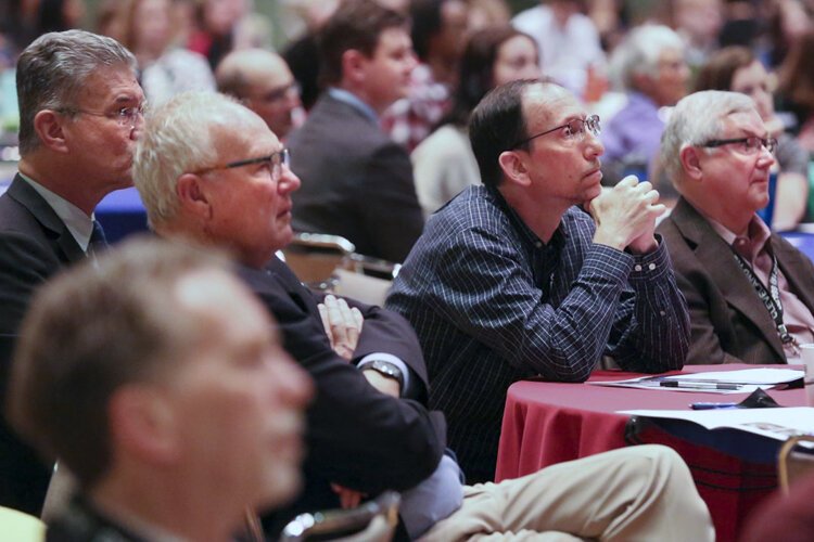 David Beach, chin on hands, listens during the final event of Sustainable Cleveland 2019 on Oct. 16 in Public Auditorium.
