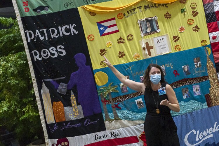 Jen McMillen Smith, LISW-S, Social Work Specialist at MetroHealth Department of Medicine, Infectious Disease, tells the stories of some of the AIDS patients on the quilts who she helped at the hospital.