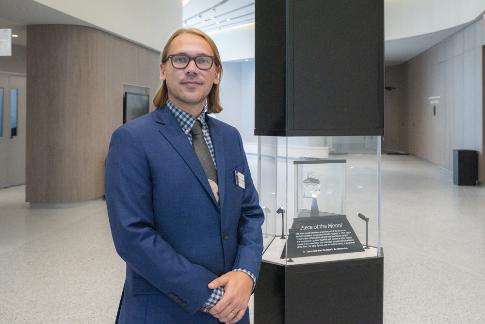 Nick Anderson, Senior Astronomer & Manager of Astronomy with the Moon Rock on loan from NASA