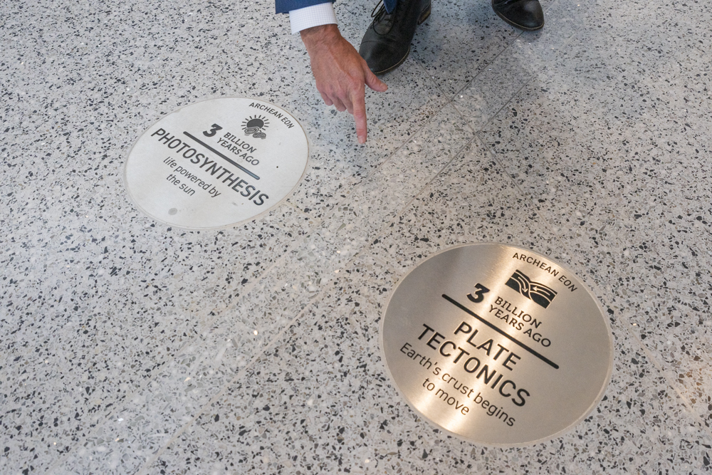 The 14,650 sq ft Visitor Hall floor contains a timeline that reflects milestones in the history of the Universe where one inch equals 1 million years
