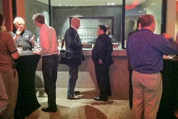 Investors and entrepreneurs networked at the Alex Theater's bar