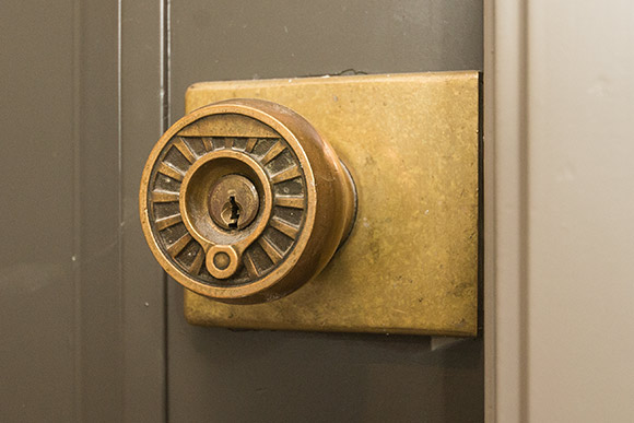 Original train wheel door knobs in the Architectural detail inside the Standard Building