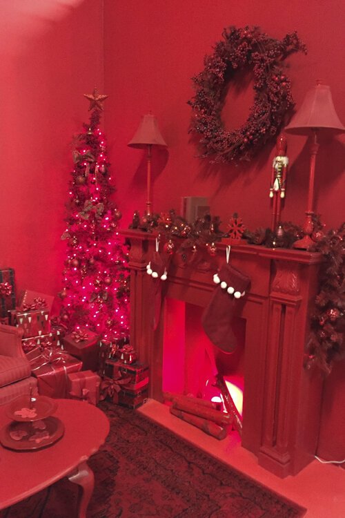 Each room is painted in a different monochrome color scheme.