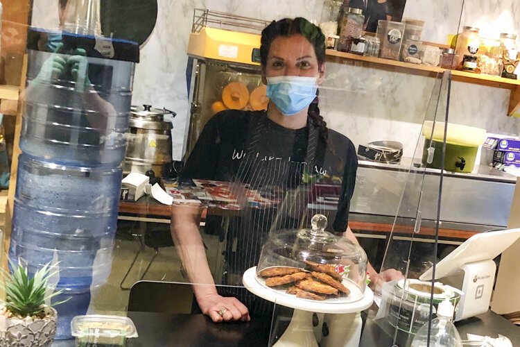 Anna took Serve-safe Covid training and installed plexi glass protection by the register and for tables.