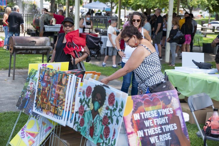 Yard Sign Art with Metro Health at ¡Celebramos! at Roberto Clemente Park