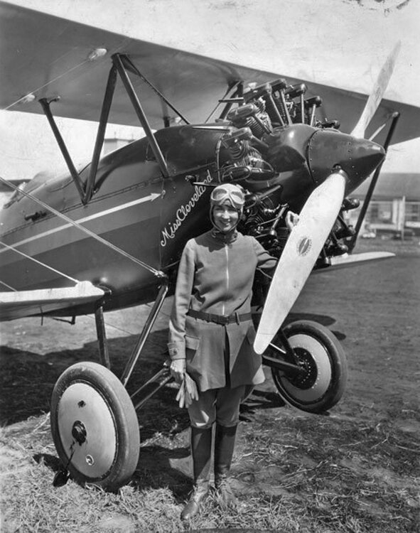 Clevelander Blanche Noyes stands in front of her plane, "The Miss Cleveland," which she used in the 1929 Women's "Powder Puff" Air Derby.